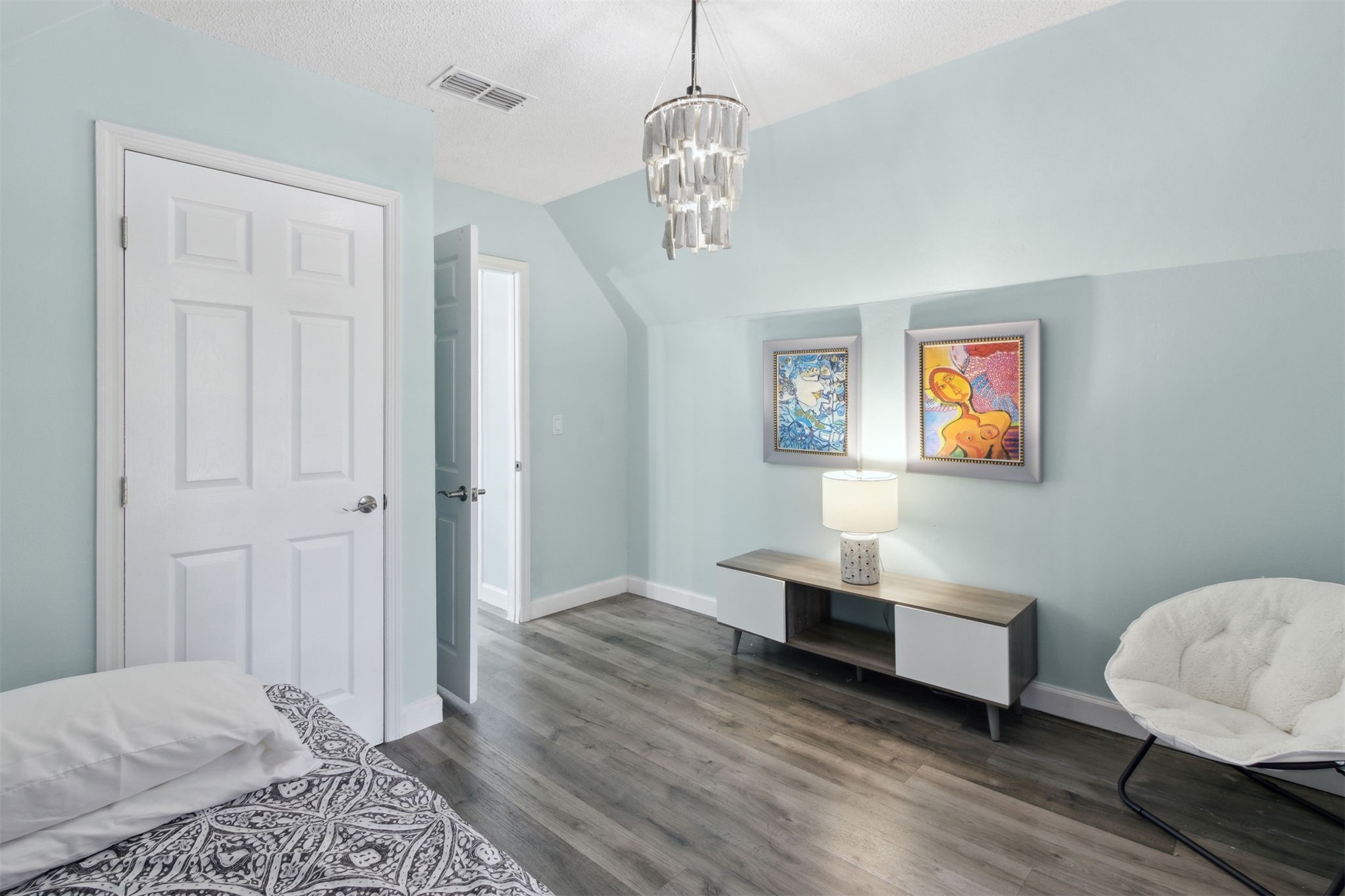 97471 Cutlass Way Yulee, FL 32097 - Photo 25 of 56 a bedroom with a bed and wooden floor