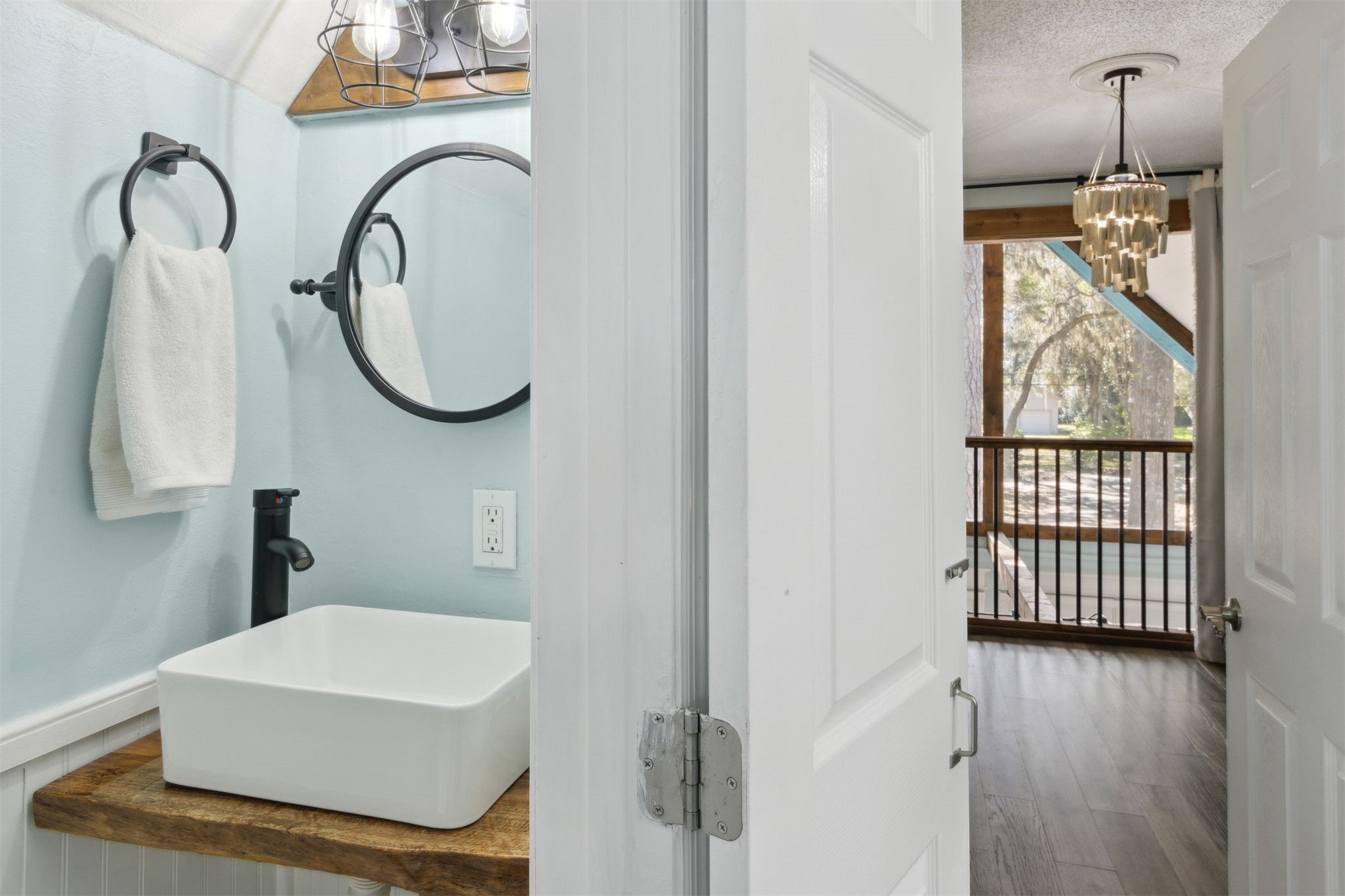 97471 Cutlass Way Yulee, FL 32097 - Photo 26 of 56 a bathroom with a sink and a mirror