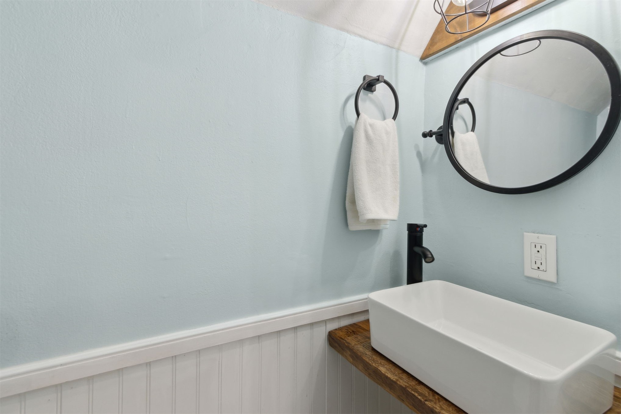 97471 Cutlass Way Yulee, FL 32097 - Photo 27 of 56 a bathroom with a sink and a mirror