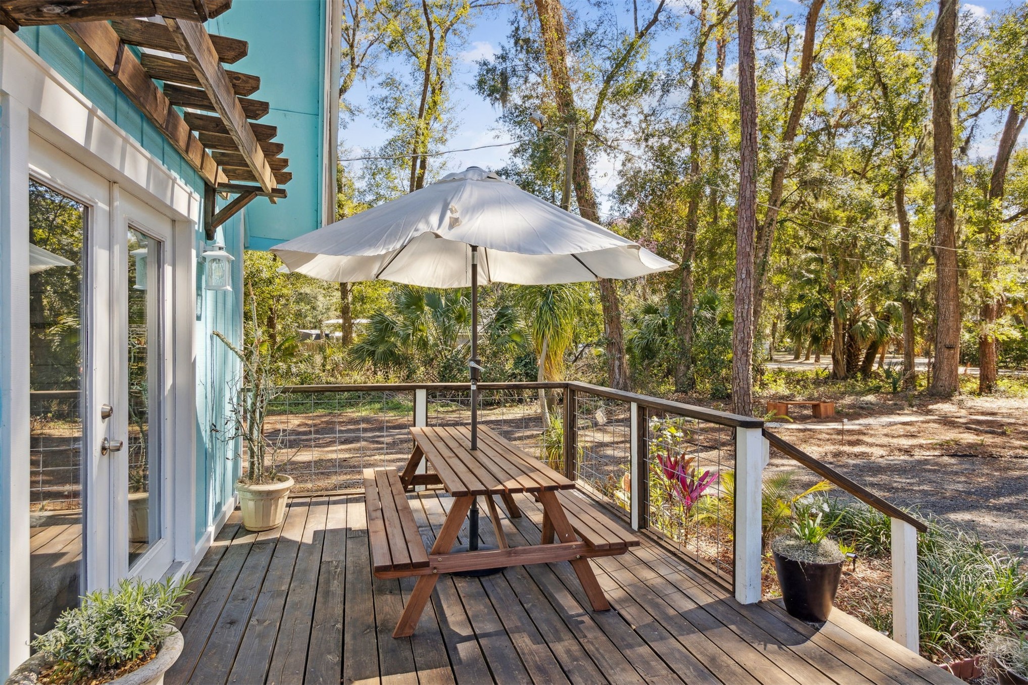 97471 Cutlass Way Yulee, FL 32097 - Photo 37 of 56 a view of outdoor space deck and outdoor kitchen