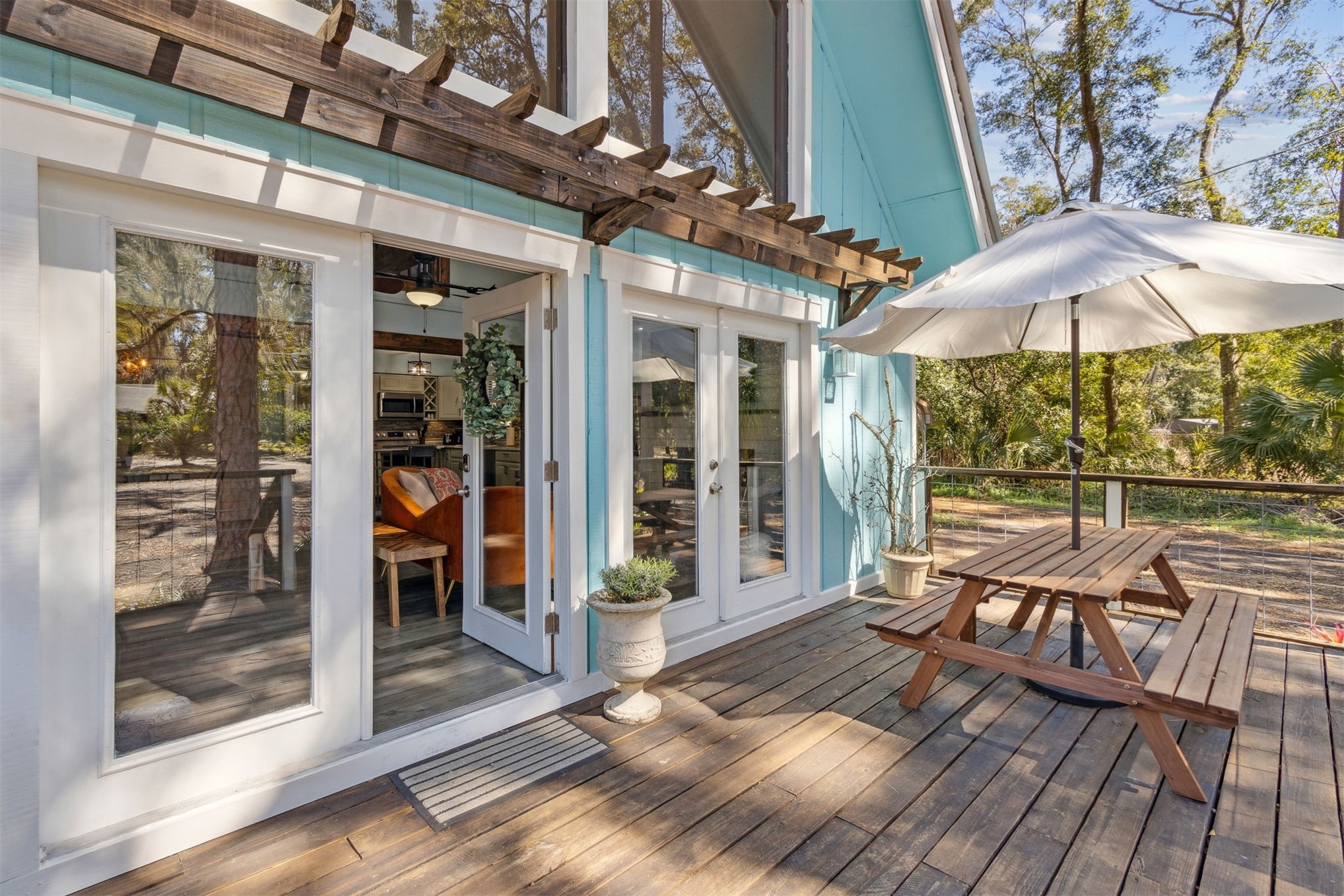 97471 Cutlass Way Yulee, FL 32097 - Photo 39 of 56 a view of a patio with a table and chairs