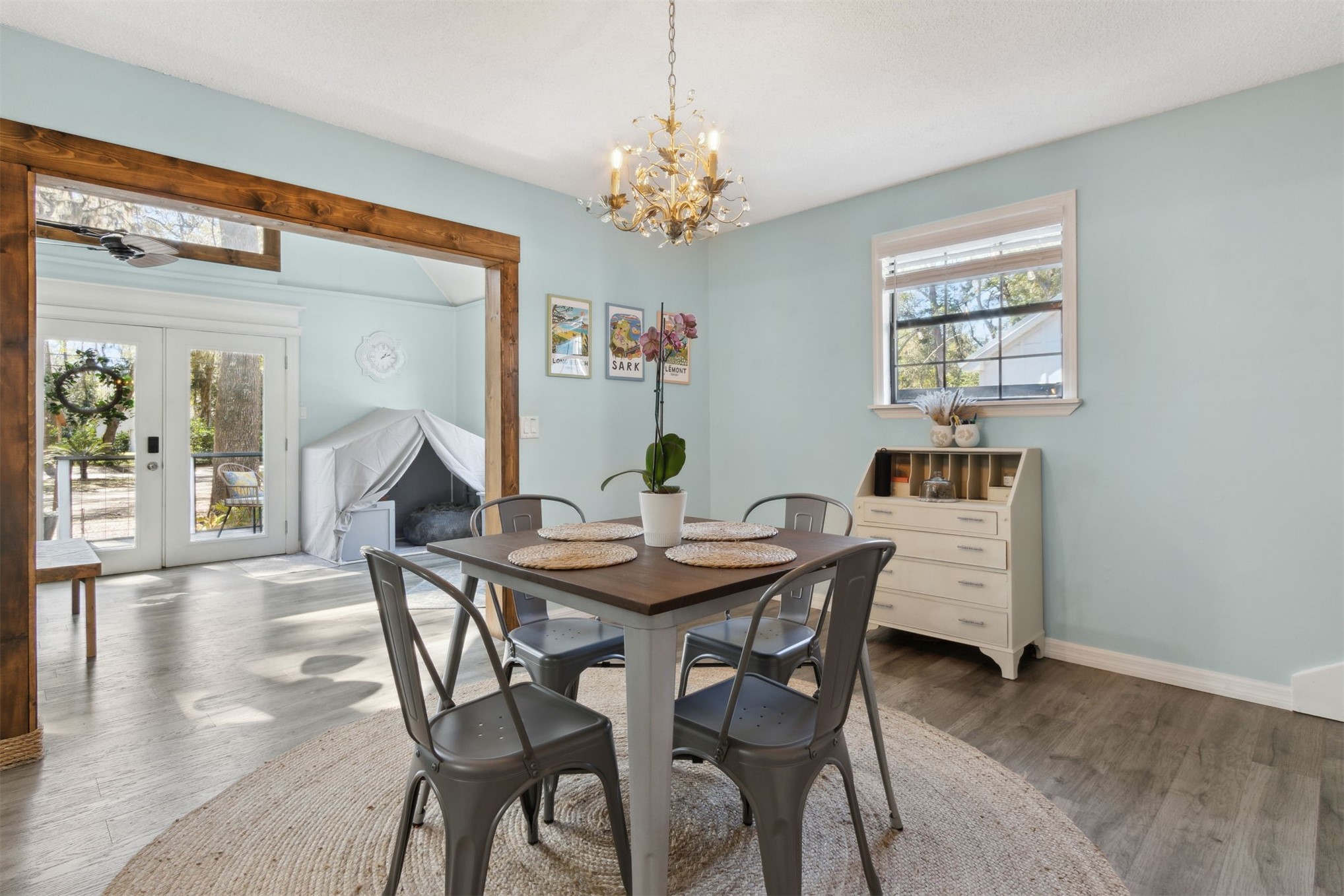 97471 Cutlass Way Yulee, FL 32097 - Photo 8 of 56 a view of a dining room with furniture and chandelier