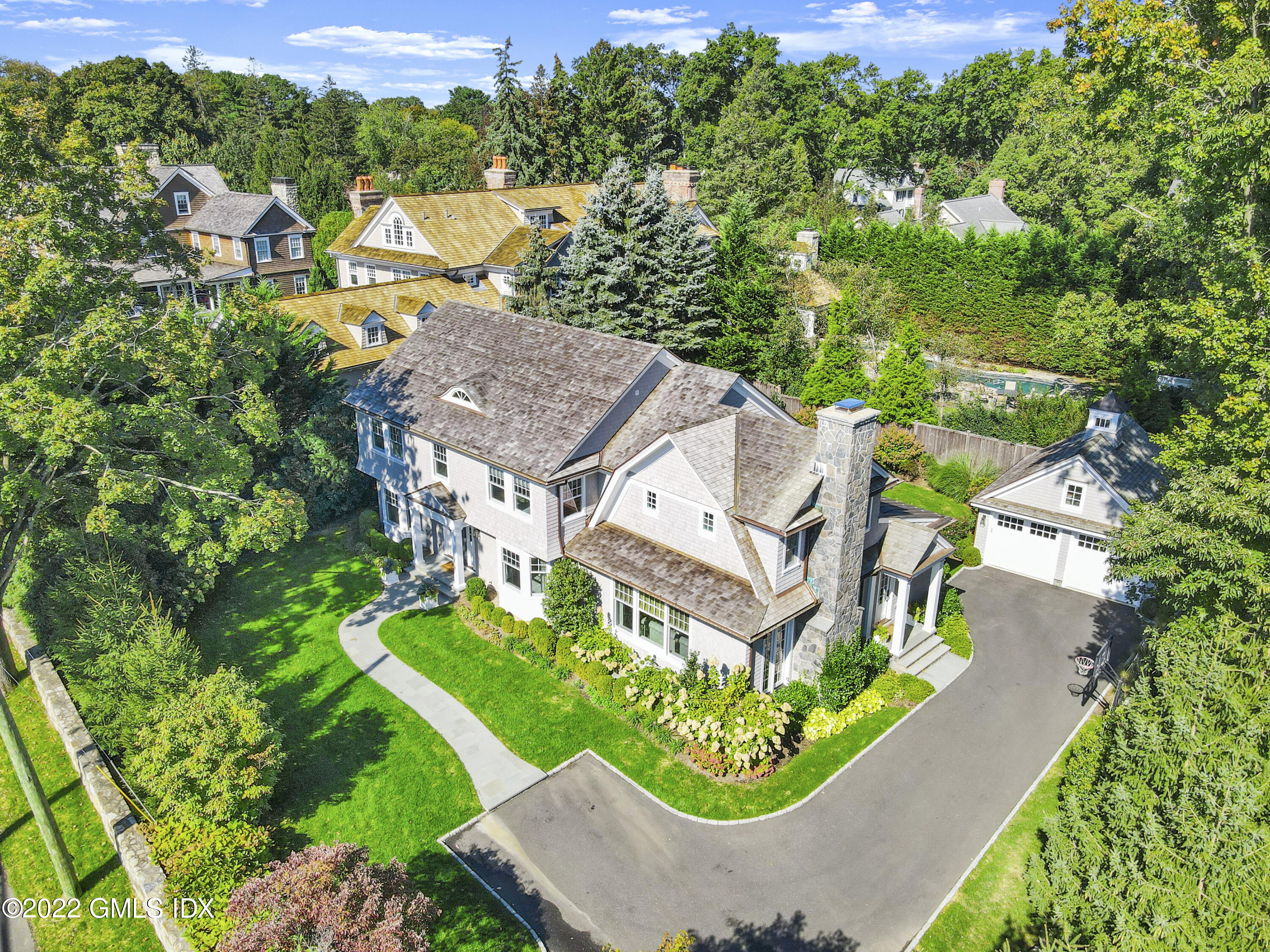 249 Riverside Avenue Riverside, CT 06878 - Photo 1 of 56 an aerial view of a house with a garden