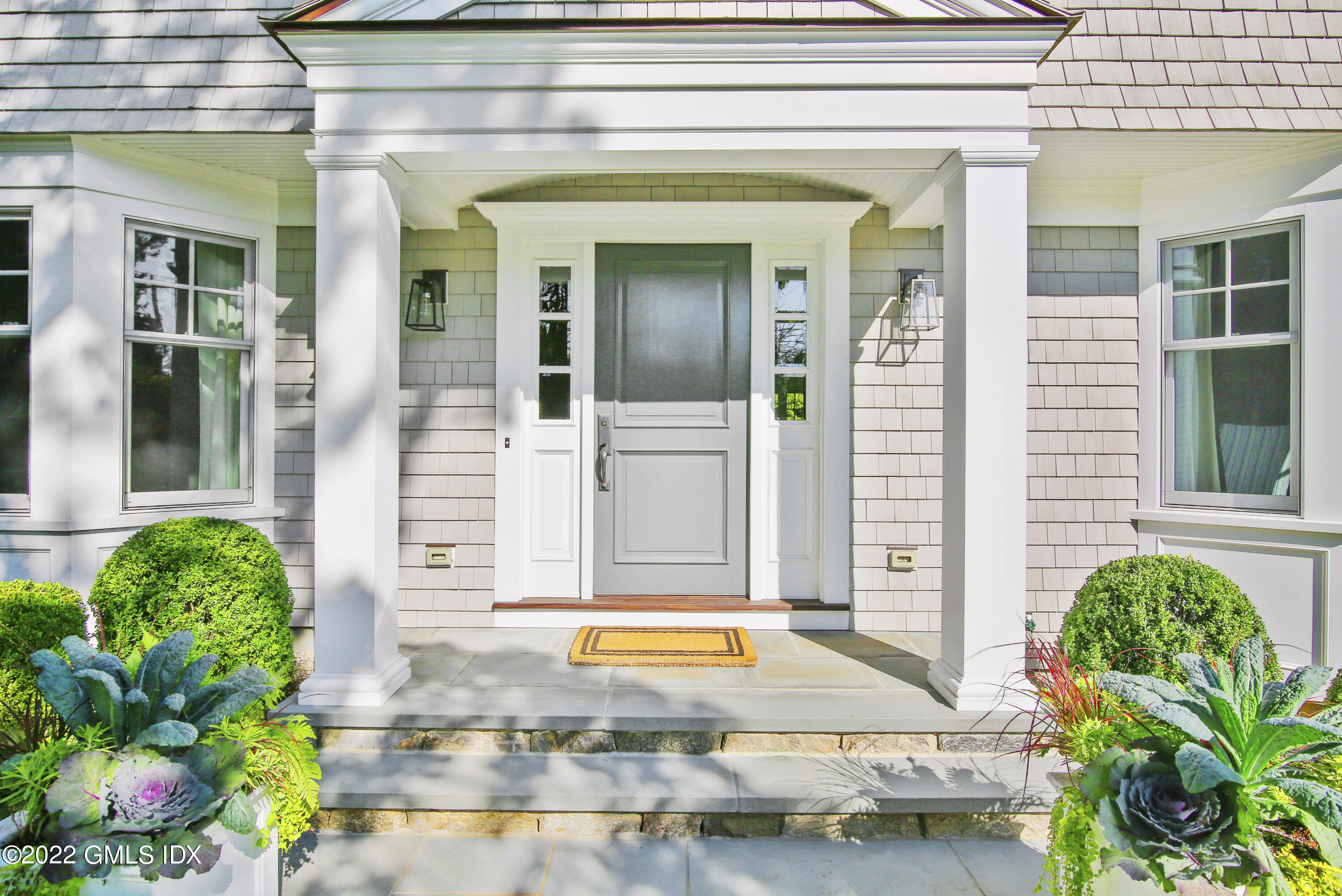 249 Riverside Avenue Riverside, CT 06878 - Photo 2 of 56 a view of yellow house with potted plants