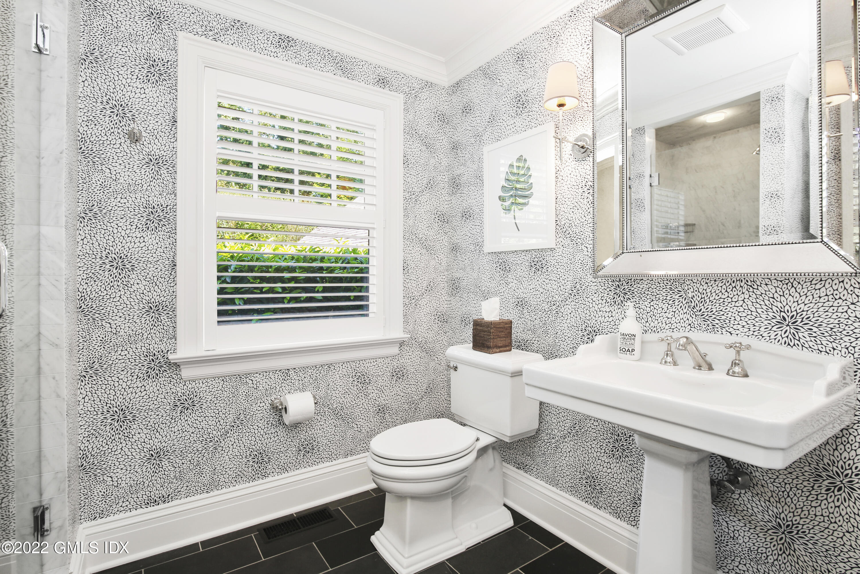 249 Riverside Avenue Riverside, CT 06878 - Photo 28 of 56 a bathroom with a sink and a toilet