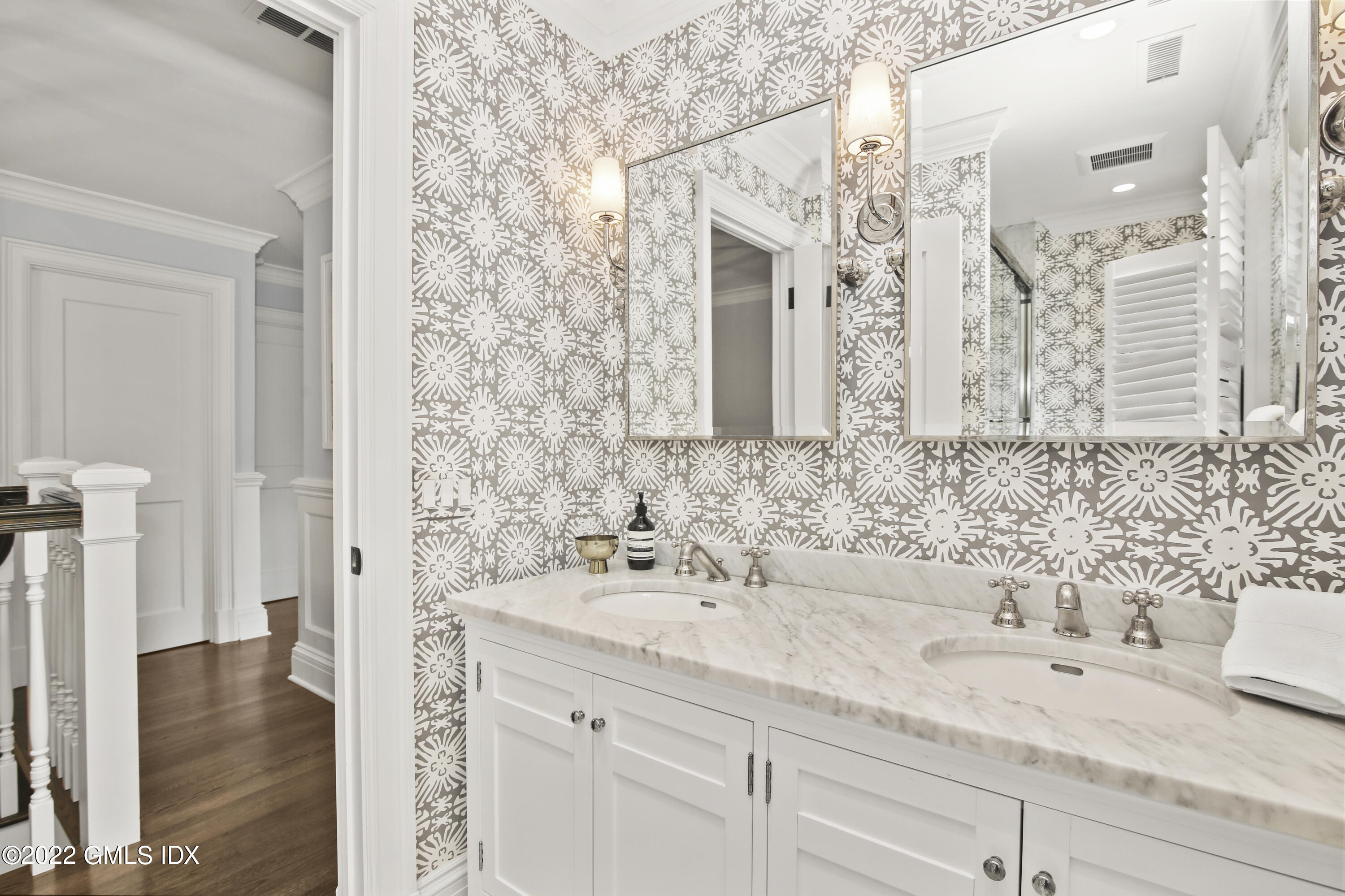 249 Riverside Avenue Riverside, CT 06878 - Photo 40 of 56 a bathroom with a sink and a mirror