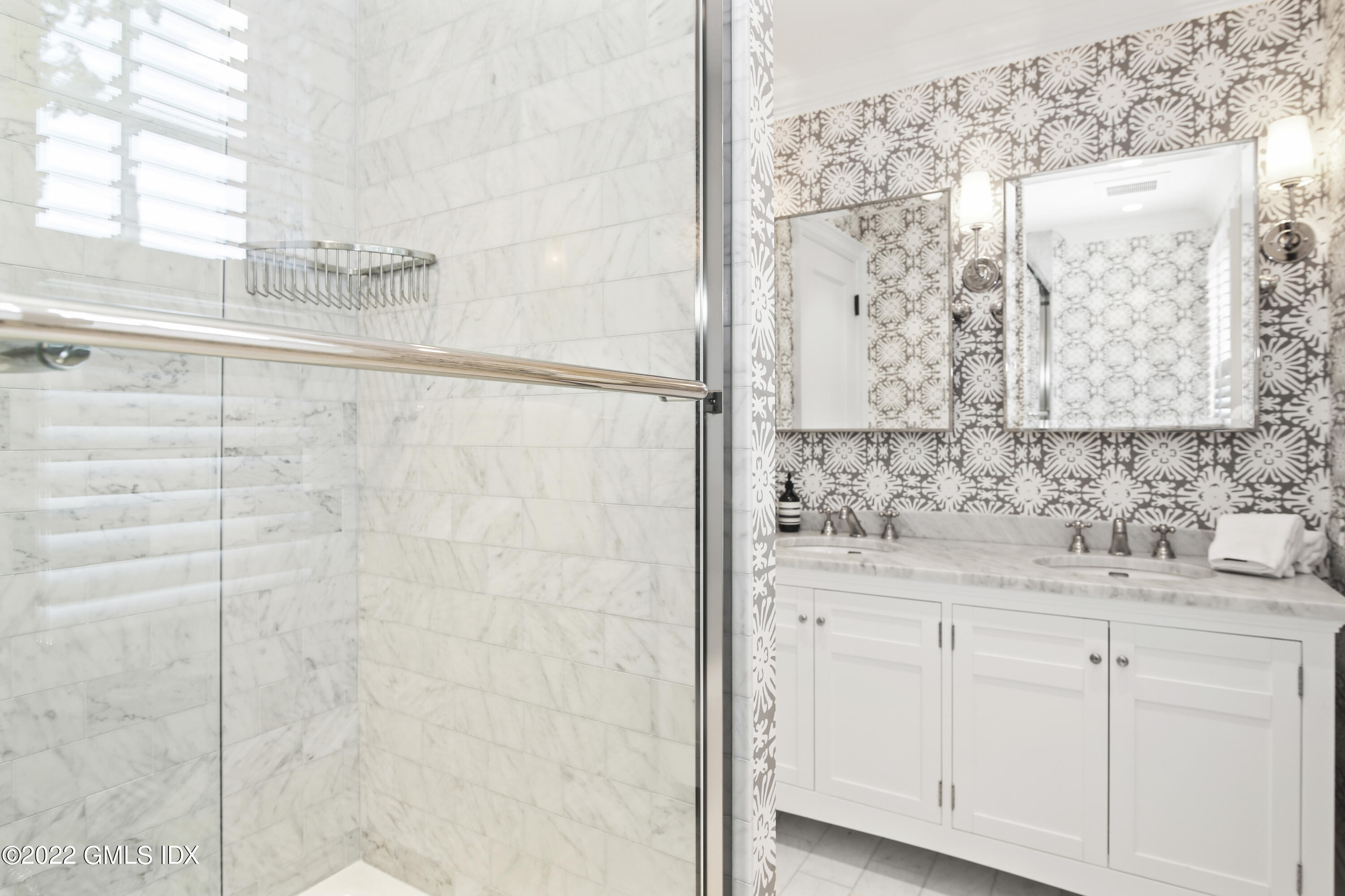 249 Riverside Avenue Riverside, CT 06878 - Photo 42 of 56 a bathroom with a sink and a mirror