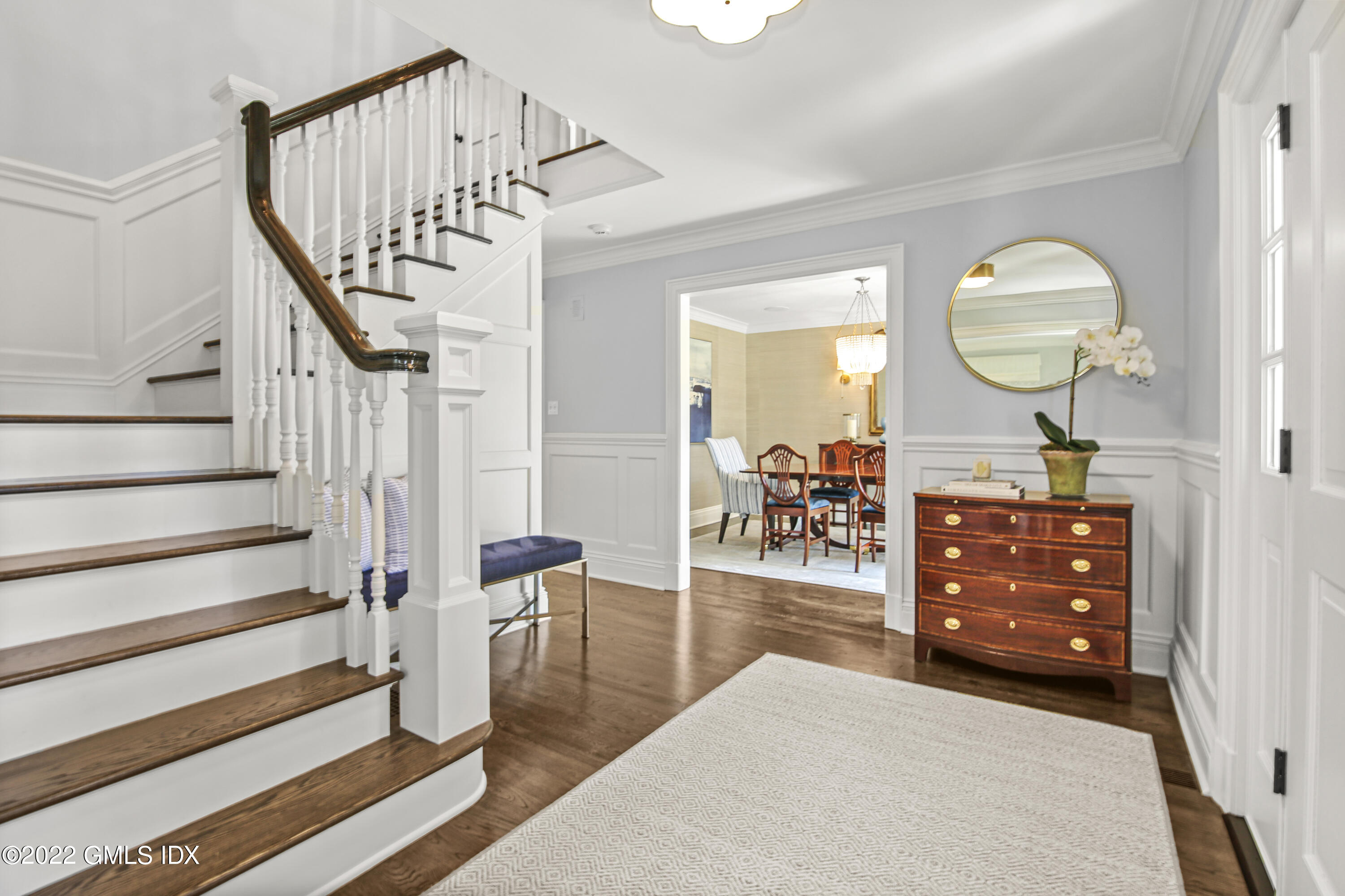 249 Riverside Avenue Riverside, CT 06878 - Photo 7 of 56 a view of a livingroom with furniture wooden floor windows and a chandelier