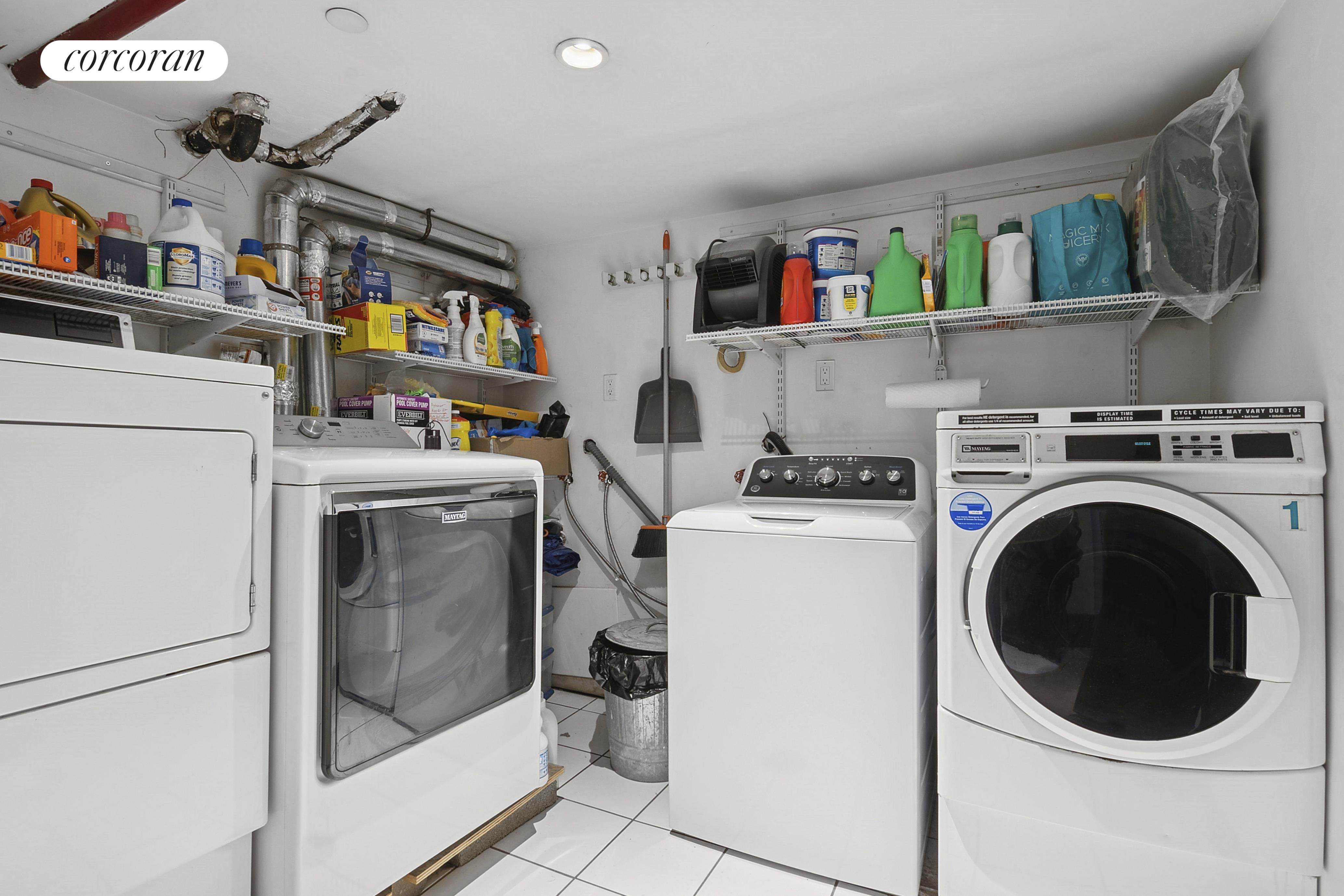 445 3rd Avenue, Unit 202 Brooklyn, NY 11215 - Photo 5 of 6 a utility room with dryer and washer
