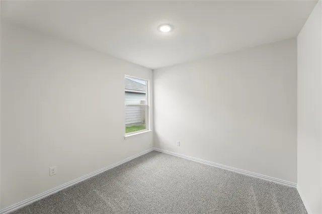 a bathroom with a double vanity sink mirror and shower
