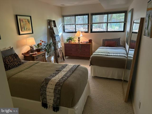 2118 Welsh Valley Road Phoenixville, PA 19460 - Photo 23 of 37 a bedroom with a bed and glass window