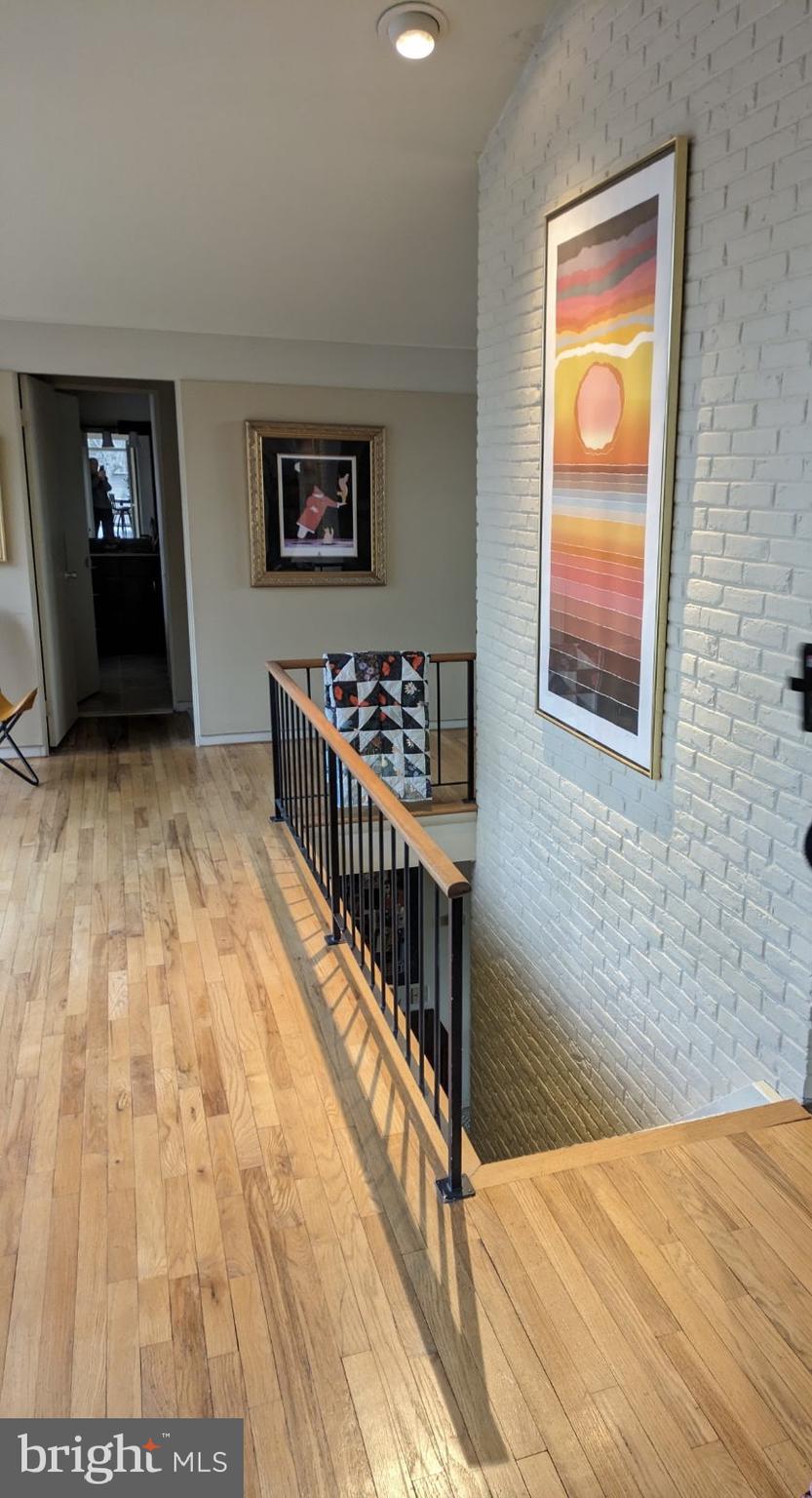 2118 Welsh Valley Road Phoenixville, PA 19460 - Photo 27 of 37 a view of a hallway with wooden floor and stairs