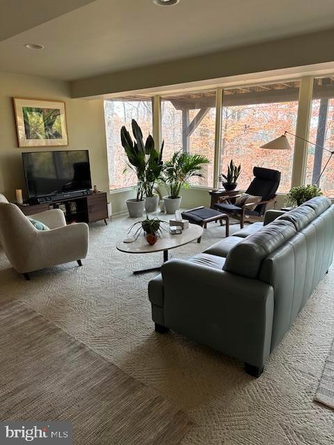 2118 Welsh Valley Road Phoenixville, PA 19460 - Photo 29 of 37 a living room with furniture a large window and a flat screen tv