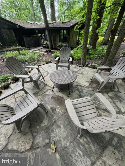 2118 Welsh Valley Road Phoenixville, PA 19460 - Photo 5 of 37 a backyard of a house with table and chairs