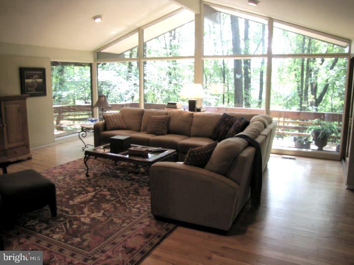 2118 Welsh Valley Road Phoenixville, PA 19460 - Photo 8 of 37 a living room with furniture and a large window