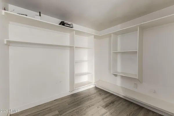 a view of an empty walk in closet