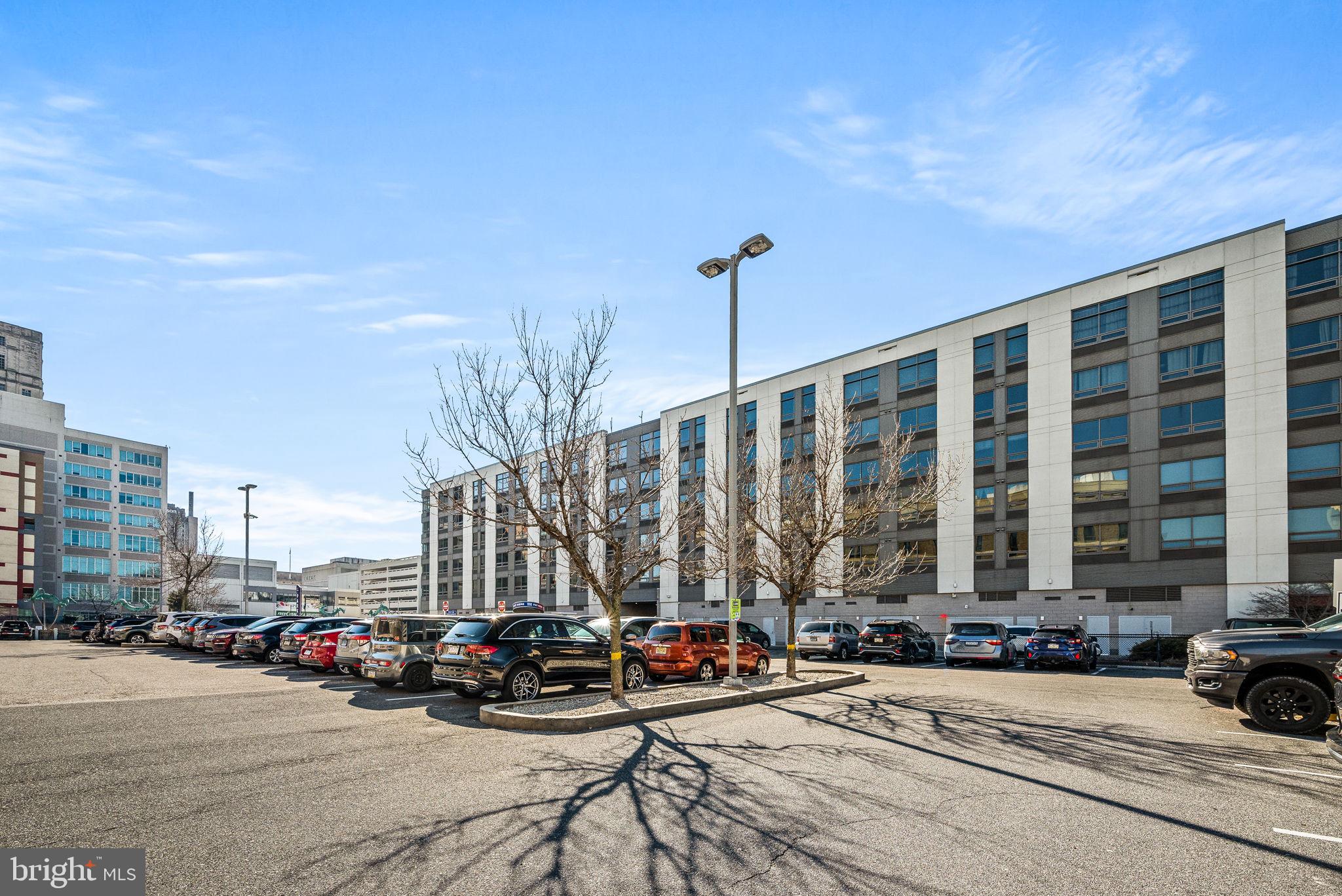 815 Arch Street, Unit 519 Philadelphia, PA 19107 - Photo 6 of 13 a view of a ocean with tall trees