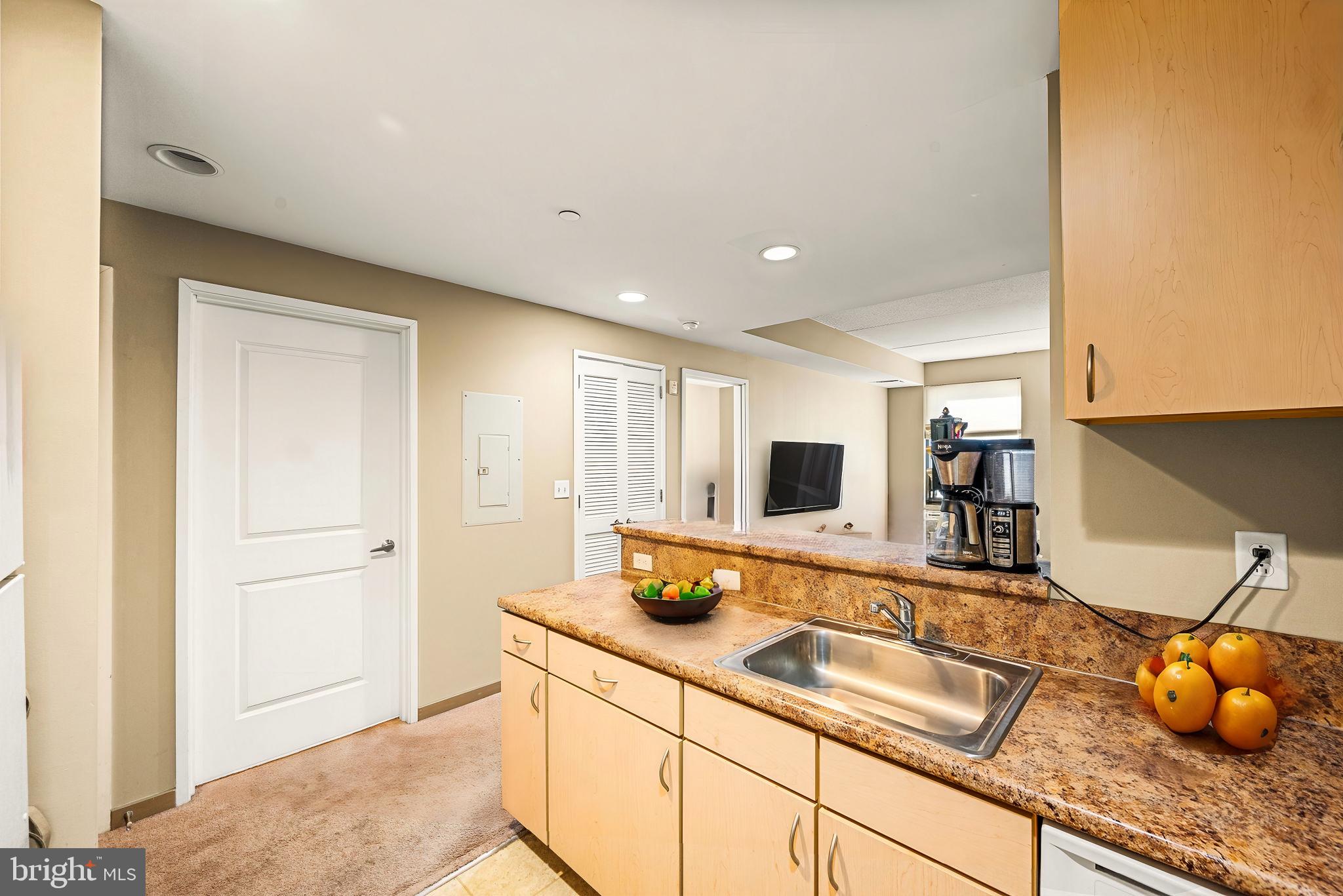 815 Arch Street, Unit 519 Philadelphia, PA 19107 - Photo 9 of 13 a bathroom with sink and mirror