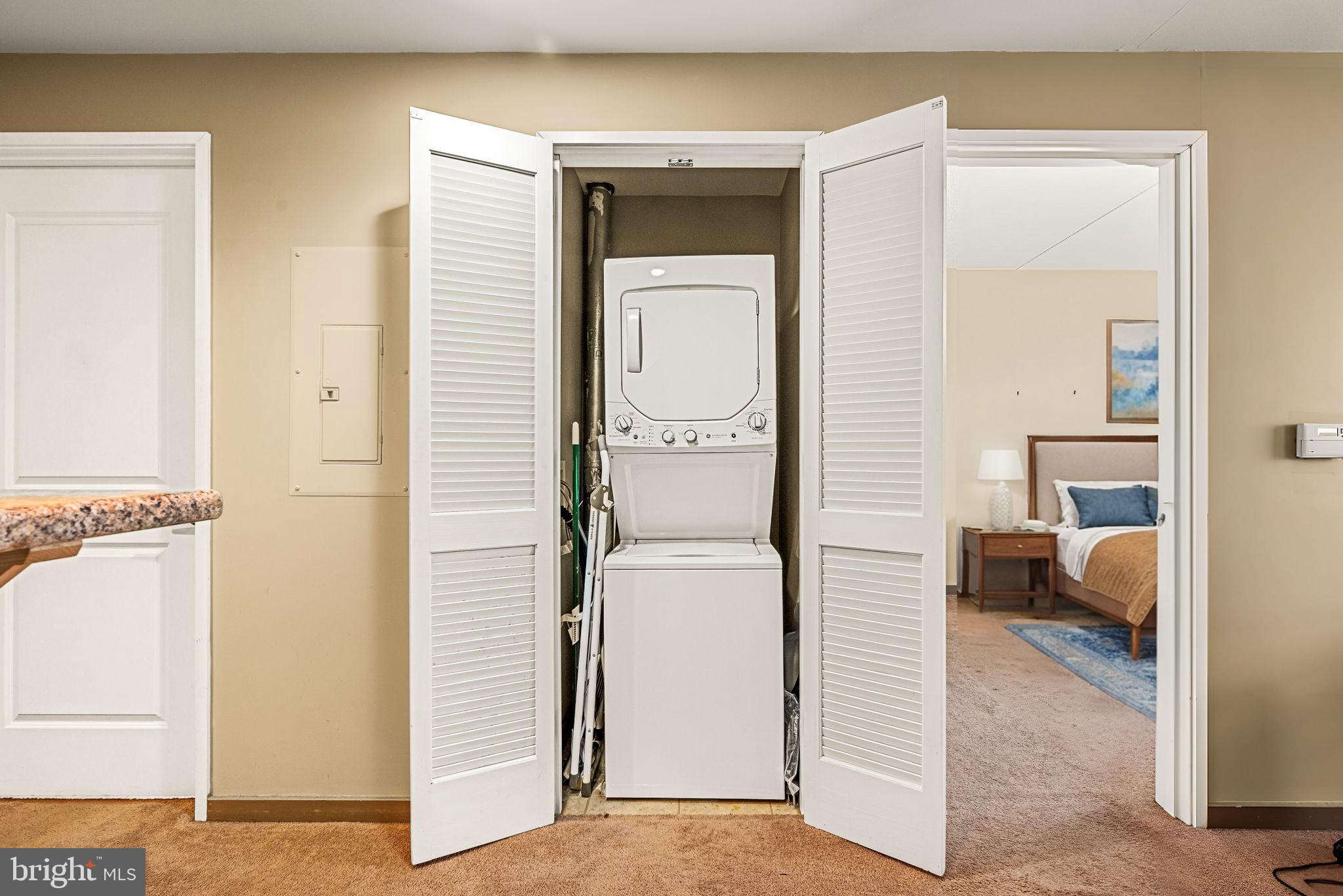 815 Arch Street, Unit 519 Philadelphia, PA 19107 - Photo 10 of 13 a utility room with dryer and washer