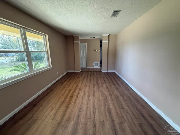 an empty room with a window