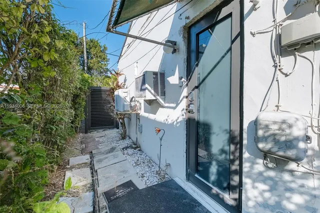 a view of a house with a street