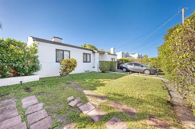 a house view with a garden space