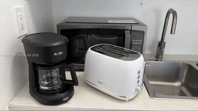 a close view of a sink washer and dryer