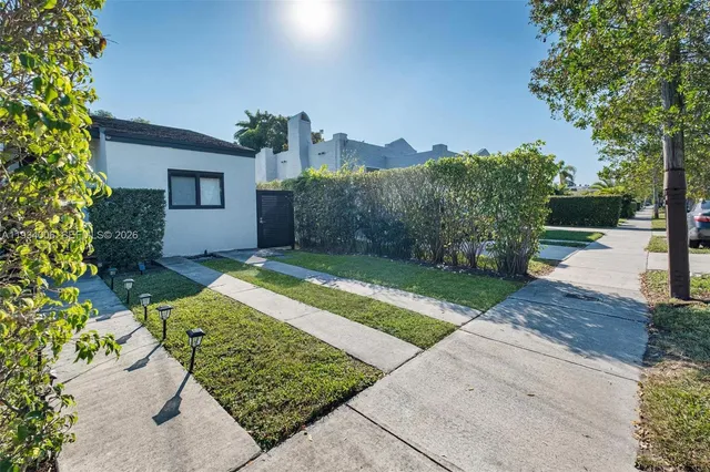 a view of a backyard with a garden