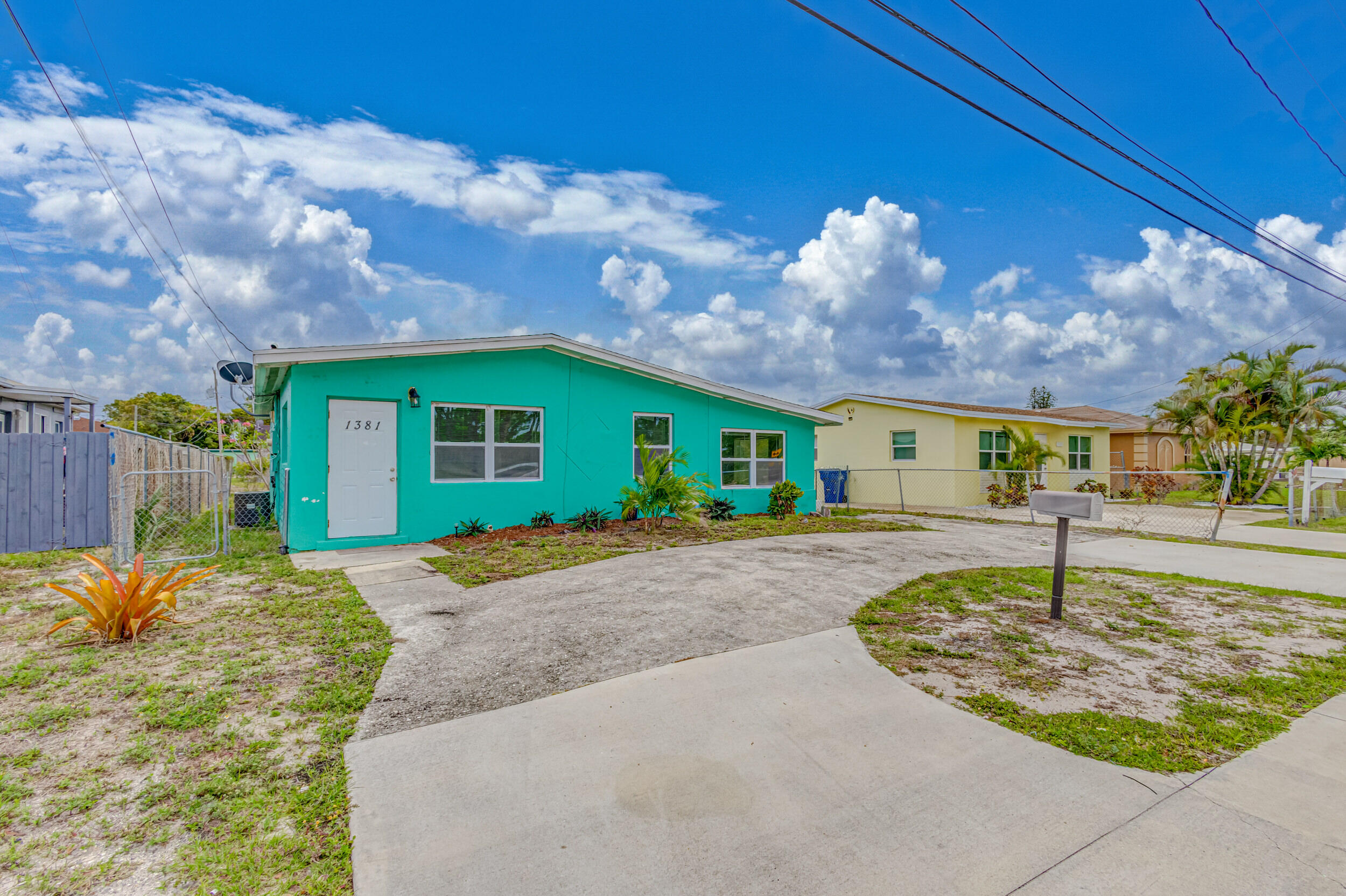 1381 Silver Beach Road Riviera Beach, FL 33404 - Photo 2 of 2 1_Entrance