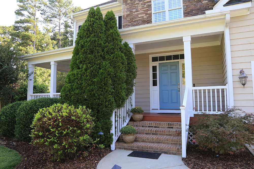 1721 Bayleaf Trail Raleigh, NC 27614 - Photo 5 of 30 Wrap around front porch is generous in size. Exterior Front