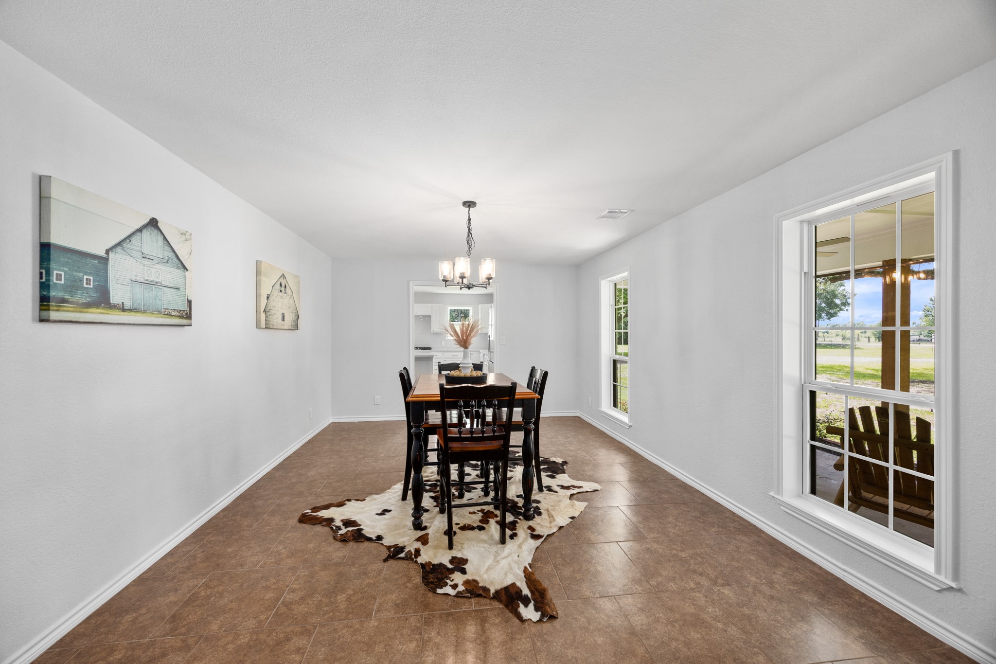 10209 Oberrender Road Needville, TX 77461 - Photo 11 of 50 Notice all the natural lighting. Formal Dining Room can also be used in many different ways.