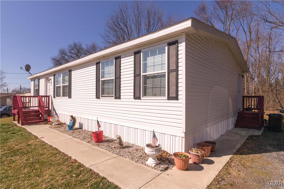 527 Norman Road Nazareth, PA 18064 - Photo 7 of 23 a view of a house with a patio