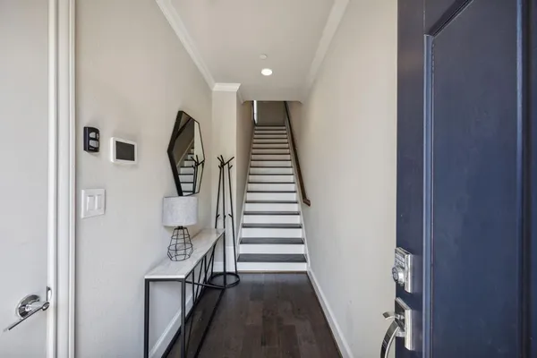 a view of a hallway with entryway