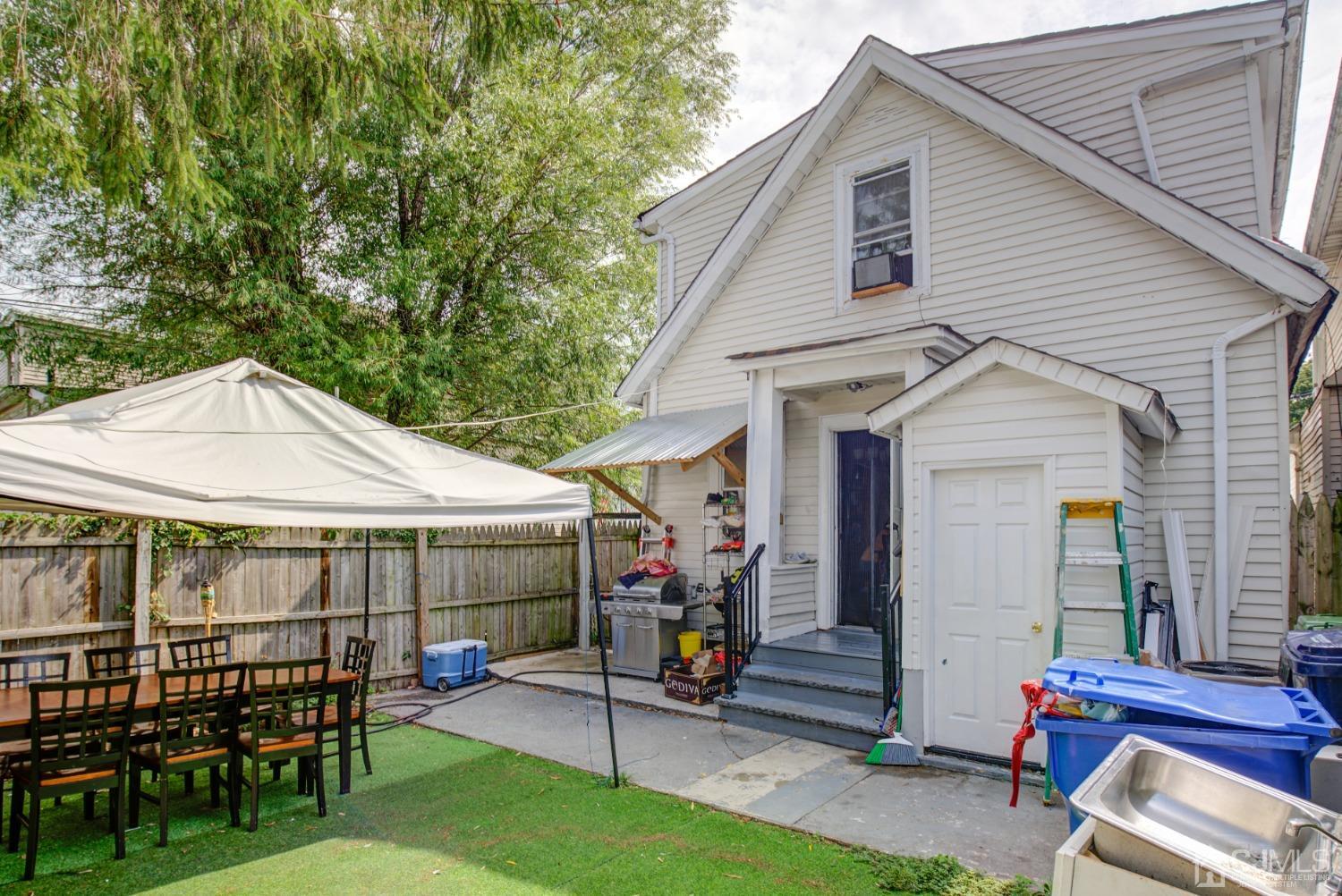 431 Baker Place Perth Amboy, NJ 08861 - Photo 3 of 16 a view of outdoor space yard and patio
