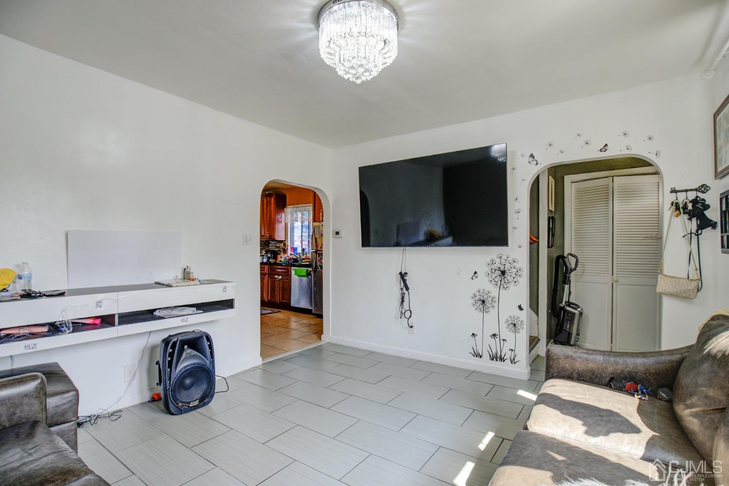 431 Baker Place Perth Amboy, NJ 08861 - Photo 6 of 16 a view of living room washer and dryer