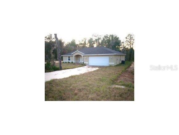 9200 Southwest 125th Ct Road Dunnellon, FL 34432 - Photo 1 of 1 a black and white photo of a house