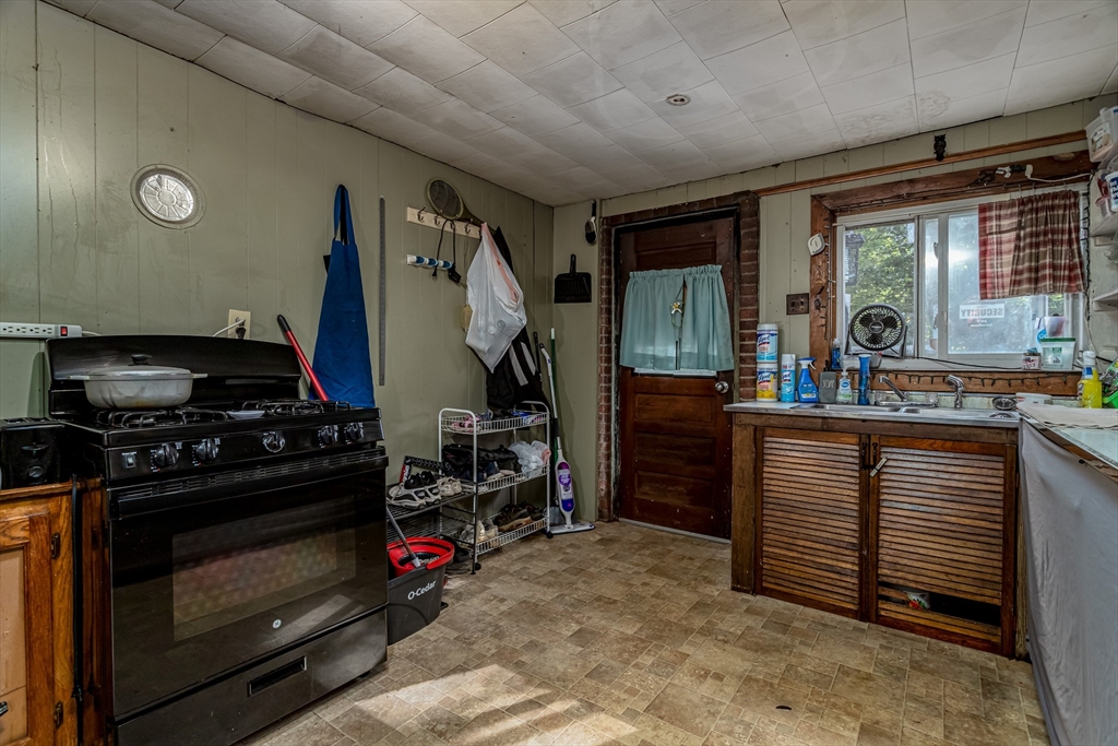 260 State Road Phillipston, MA 01331 - Photo 23 of 42 a kitchen with stainless steel appliances granite countertop a stove and a refrigerator