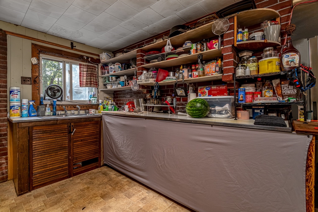 260 State Road Phillipston, MA 01331 - Photo 24 of 42 a room with lots of wooden cabinets