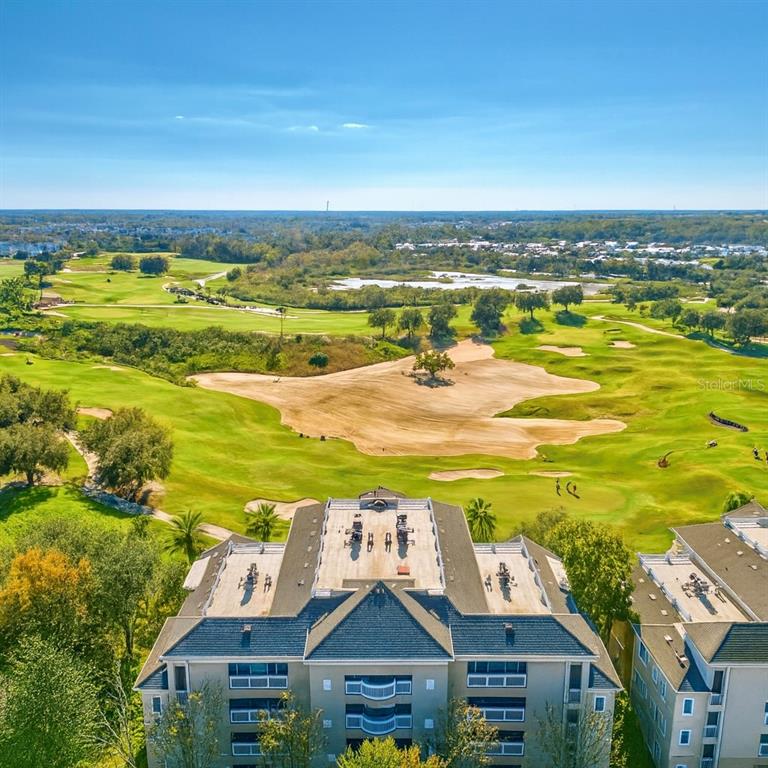 1370 Centre Ct Ridge Drive, Unit 401 Reunion, FL 34747 - Photo 1 of 51 a view of an ocean from a building