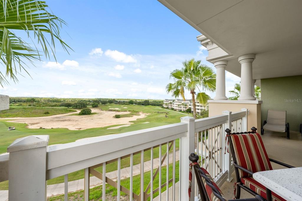 1370 Centre Ct Ridge Drive, Unit 401 Reunion, FL 34747 - Photo 35 of 51 a view of a balcony with ocean view