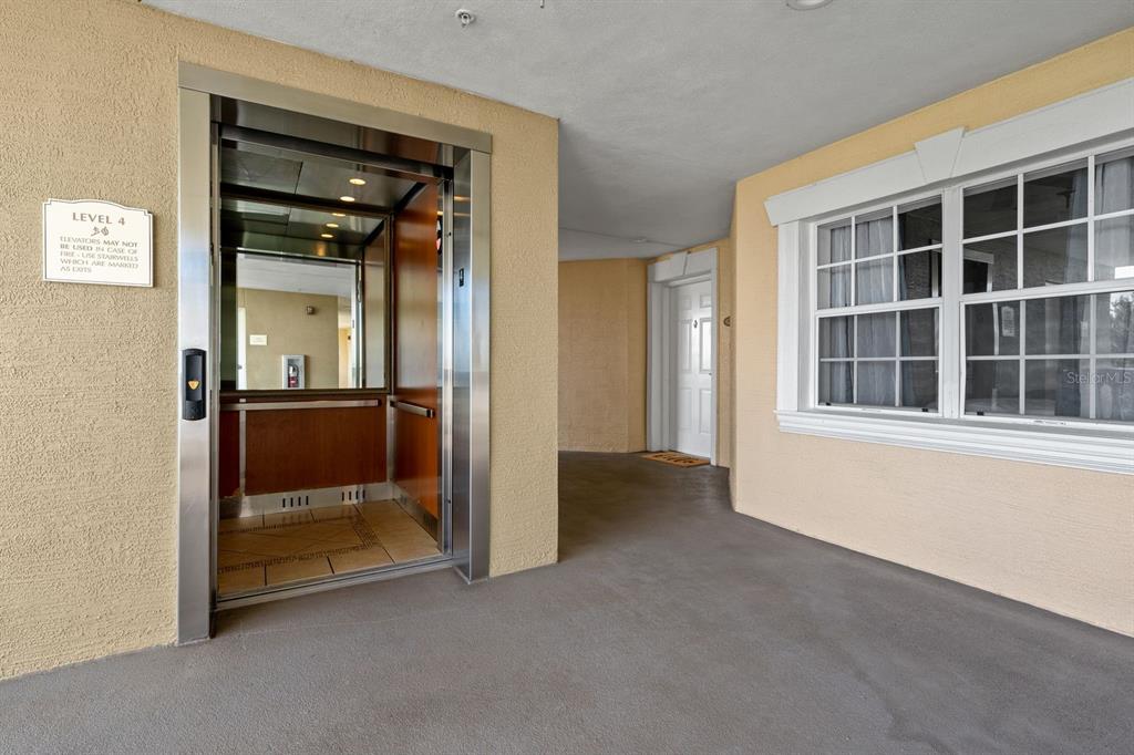 1370 Centre Ct Ridge Drive, Unit 401 Reunion, FL 34747 - Photo 4 of 51 a view of an empty room with a window