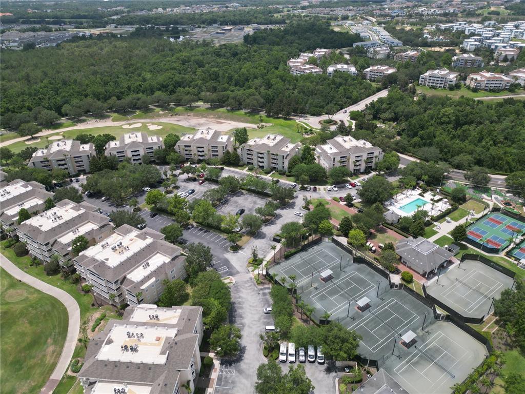 1370 Centre Ct Ridge Drive, Unit 401 Reunion, FL 34747 - Photo 41 of 51 an aerial view of residential houses with outdoor space