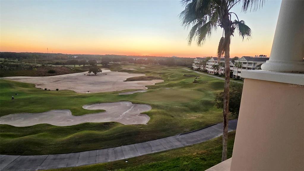 1370 Centre Ct Ridge Drive, Unit 401 Reunion, FL 34747 - Photo 42 of 51 an aerial view of residential houses with outdoor space