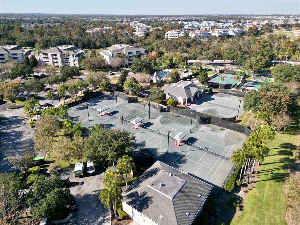1370 Centre Ct Ridge Drive, Unit 401 Reunion, FL 34747 - Photo 46 of 51 an aerial view of a city with lots of residential buildings