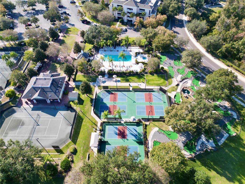 1370 Centre Ct Ridge Drive, Unit 401 Reunion, FL 34747 - Photo 48 of 51 an aerial view of a houses with yard
