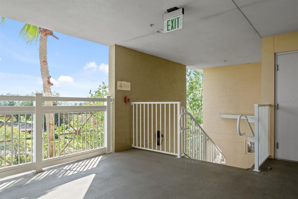 1370 Centre Ct Ridge Drive, Unit 401 Reunion, FL 34747 - Photo 5 of 51 a view of a hallway with windows