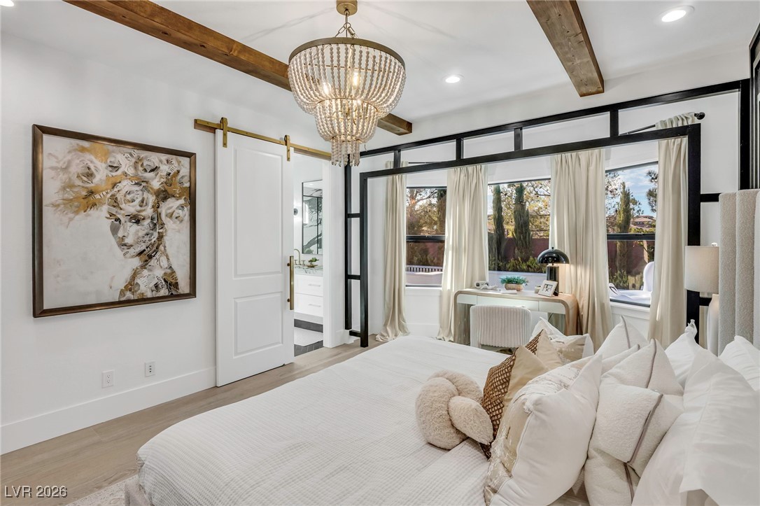2709 Rue Toulouse Avenue Henderson, NV 89044 - Photo 15 of 43 Primary Bedroom with Bathroom Barn Door Entry