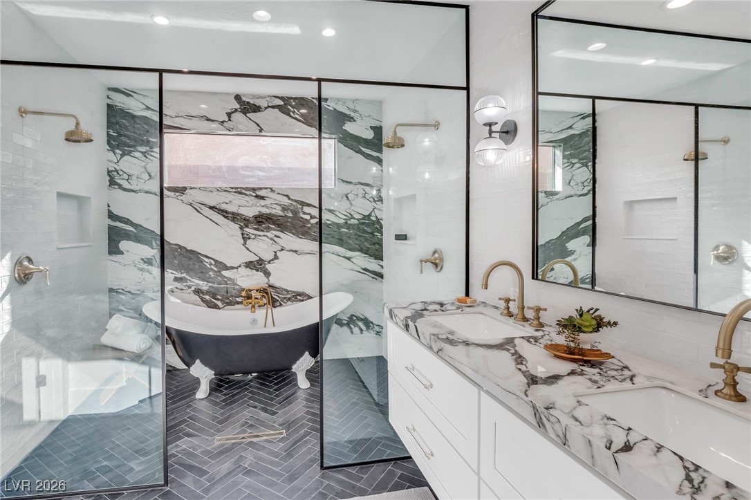 2709 Rue Toulouse Avenue Henderson, NV 89044 - Photo 18 of 43 Primary Bathroom with Floating Vanity/Walk In Shower and Freestanding Tub