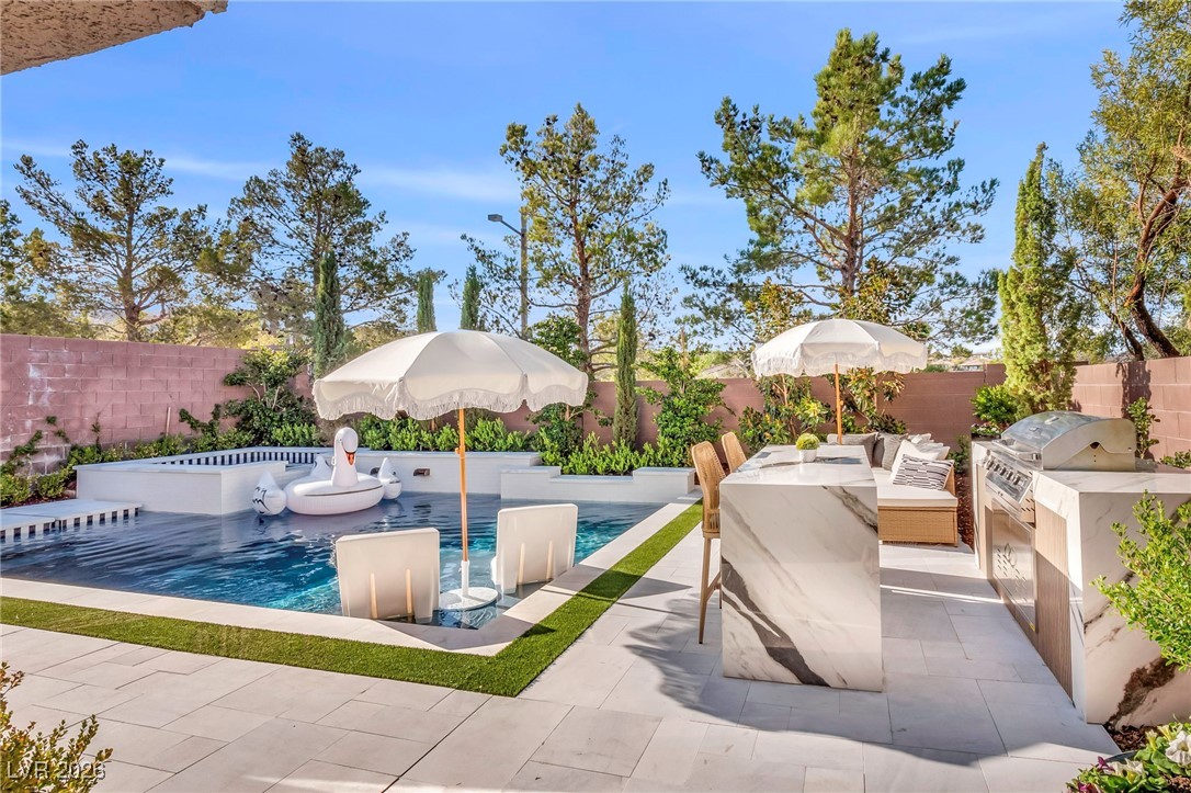 2709 Rue Toulouse Avenue Henderson, NV 89044 - Photo 29 of 43 Backyard with Built In BBQ and Island