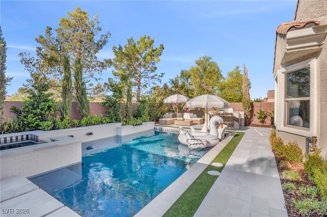 2709 Rue Toulouse Avenue Henderson, NV 89044 - Photo 31 of 43 Pool with Raised Spa and Seating